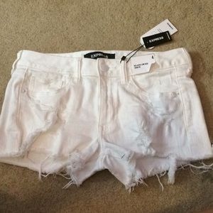 white EXPRESS distressed low rise jean shorts